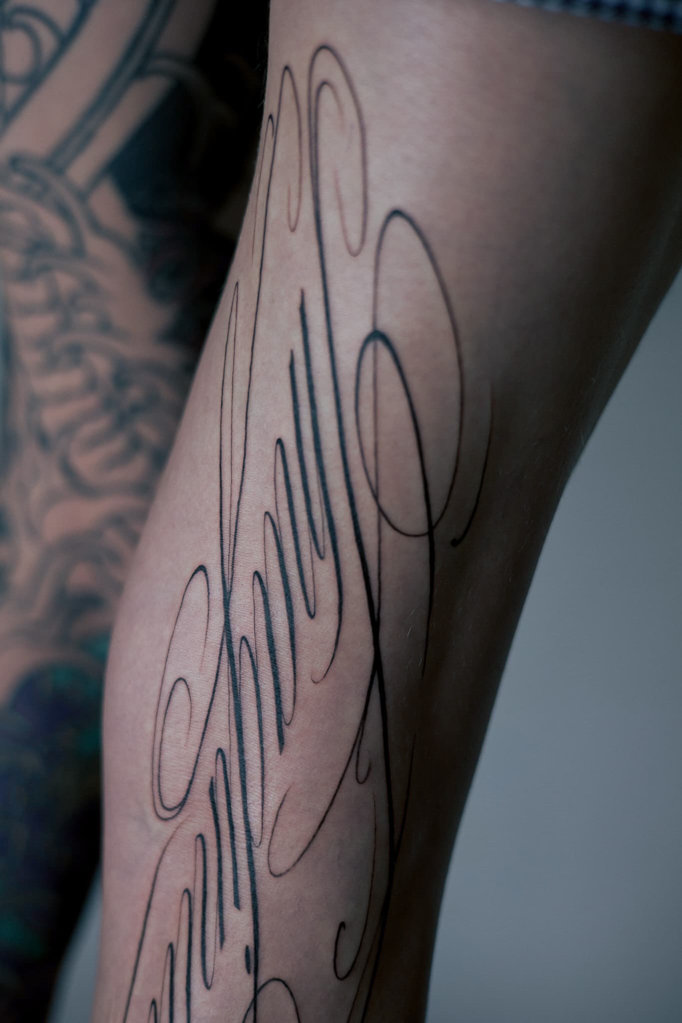 Fine line tattoo composition in grid